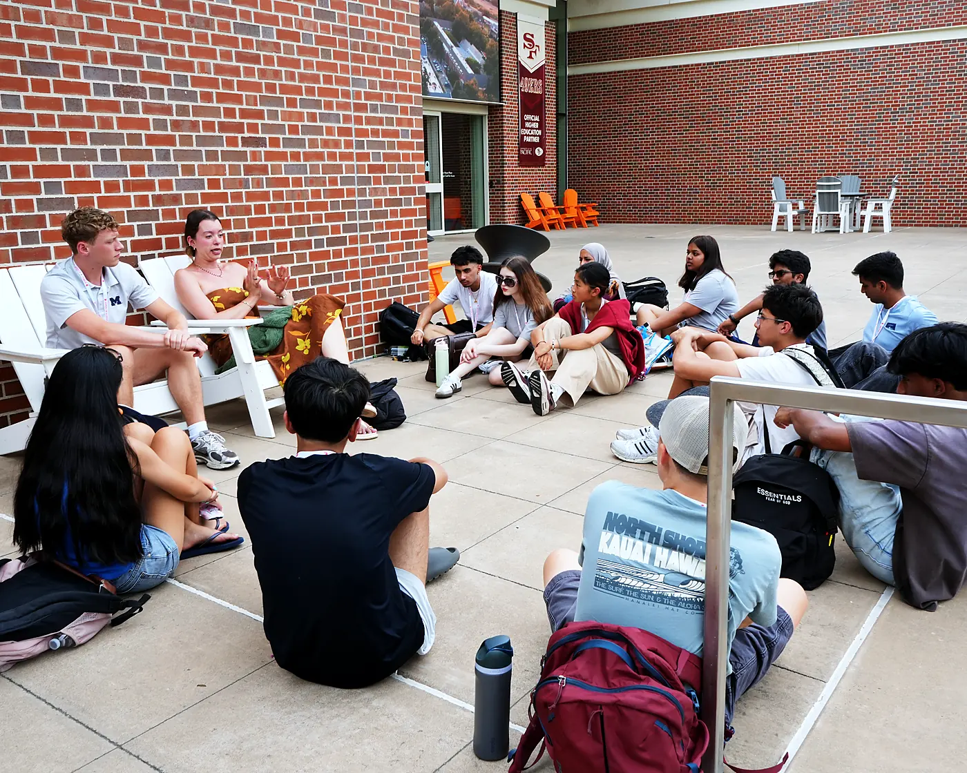 Ascend students relaxing together between sessions