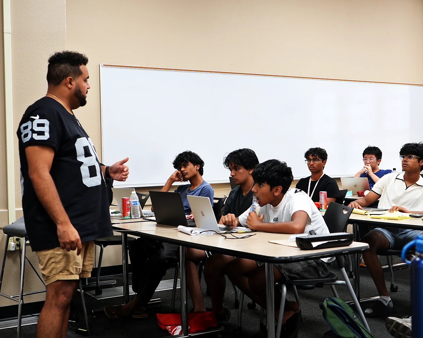 An Ascend coach leading a lab session